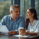 AI-generated image of a smiling man and woman at a café table, looking at each other while he holds a document and she holds a coffee cup